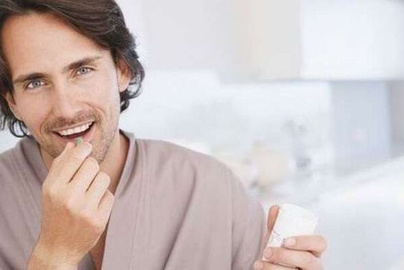 The man takes the medicine to enhance a member