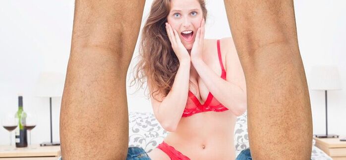 A woman surprised by the increased size of a man's penis Photo 2